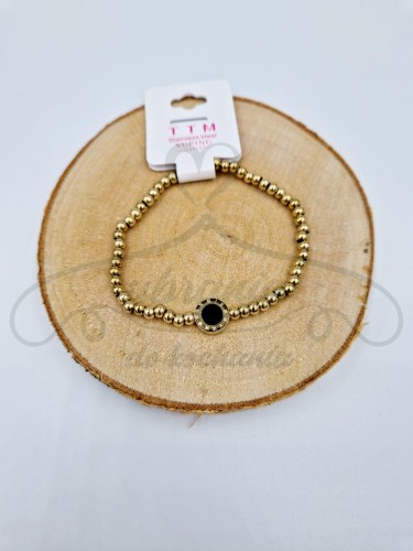 Bransoletka złote koraliki.jpg